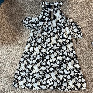 Black dress with gold accented flowers.